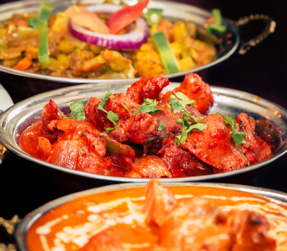 3 pots of Indian Food at the Holi Dallas Festival.  Looks Yummy!
