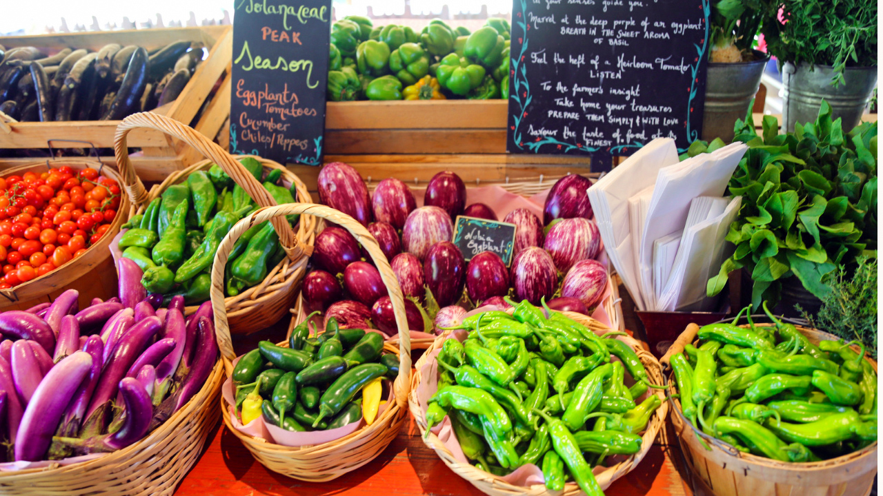 Fresh veggies for purchase at a Dallas Farmer's Market Vendor's stand.