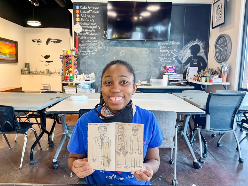 young lady at flower mound art class