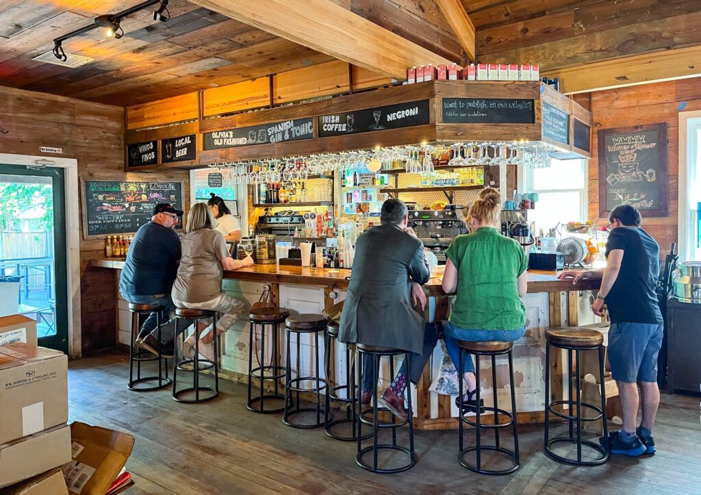 Coffee and bar space inside The Wild Detectives in Bishop Arts District