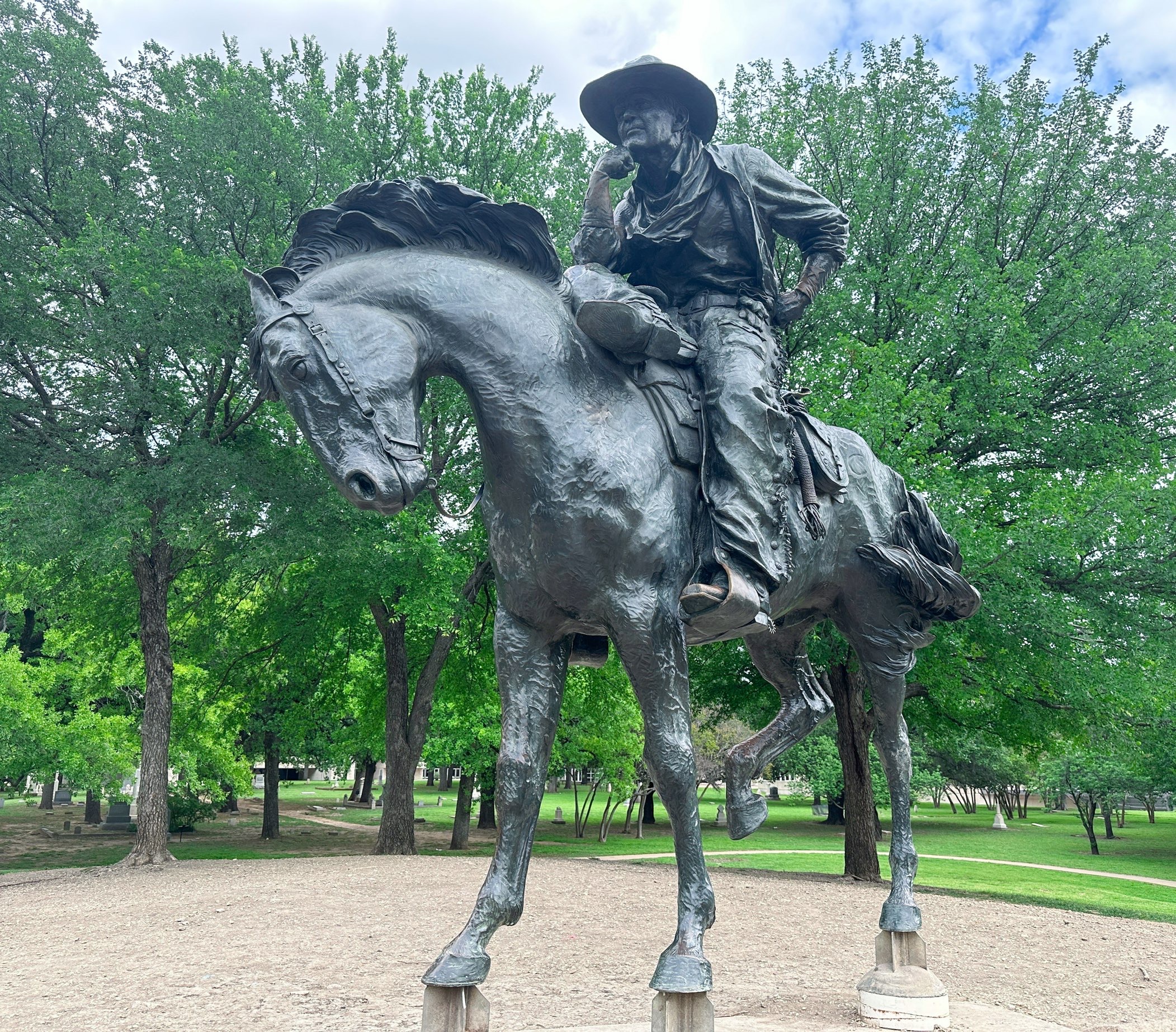 Bronze cowboy and cattle sculptures at Pioneer Plaza Dallas