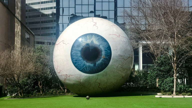 This giant eyeball sculpture created by artist Tony Tasset is a 30-foot-tall fiberglass, resin, and steel installation—a replica of the artist’s own eye, featured among free things to do in Dallas at night.. The Giant Eye can also be seen on the JFK Dallas Tour