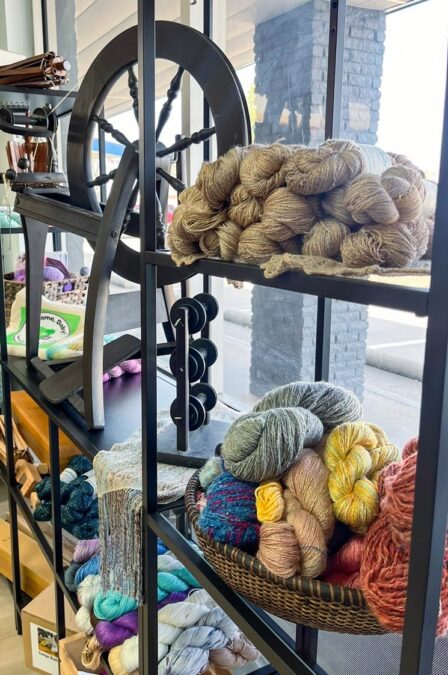Display of earth tone skeins of yarn at dallas fiber festival
