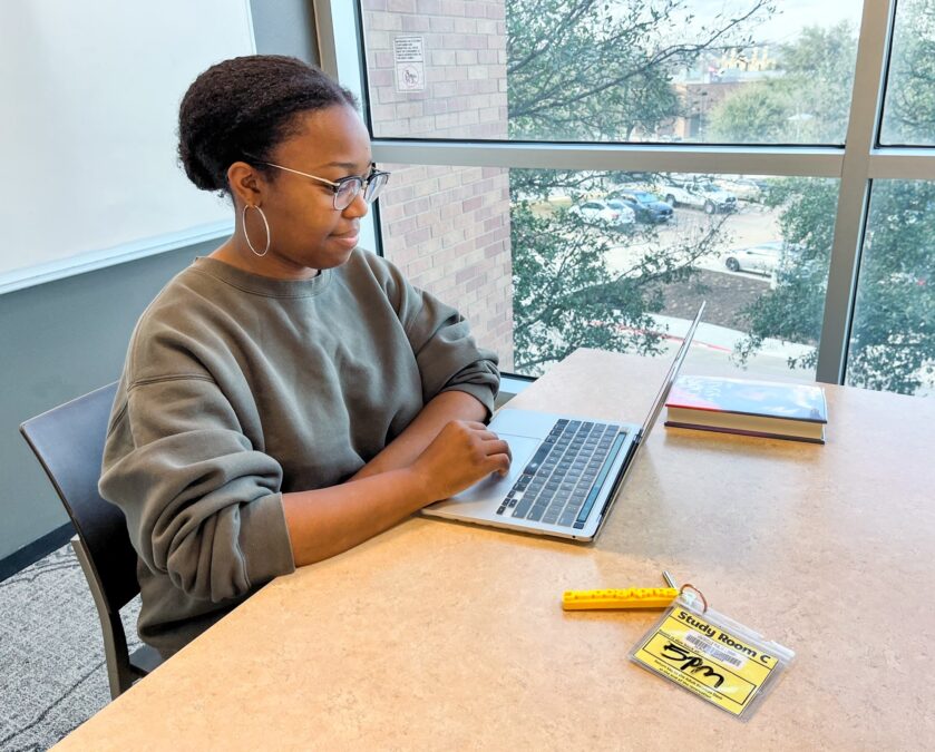 young lady studying in reserved room at Lewisville branch library