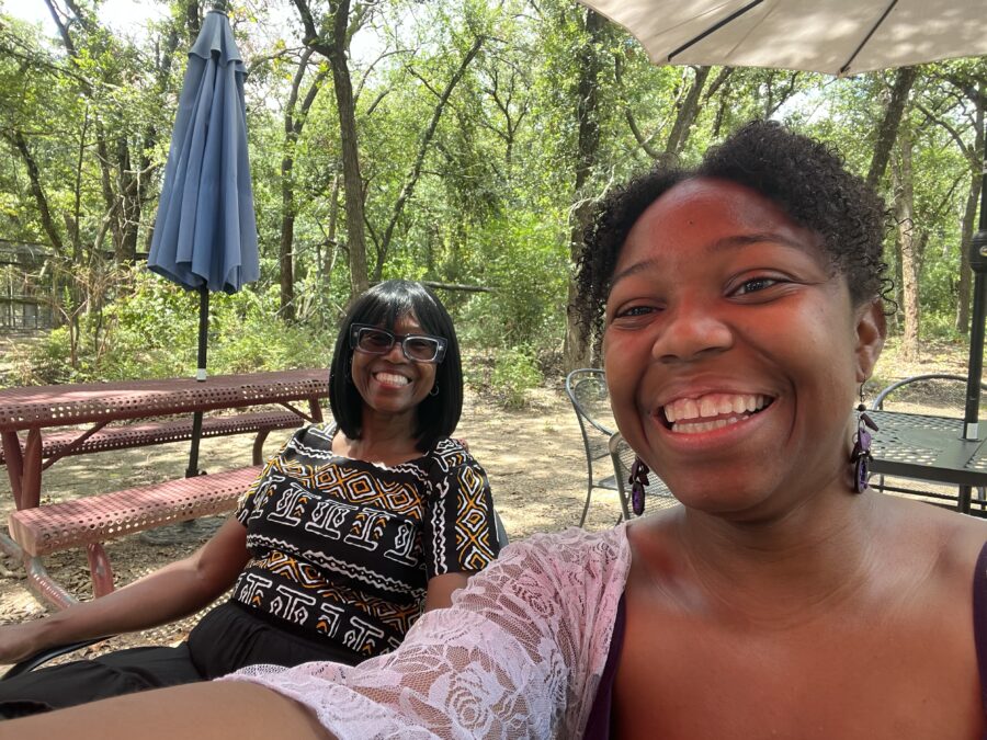 A mother and daughter sitting together at a table at the Lavender Ridge Farm cafe.