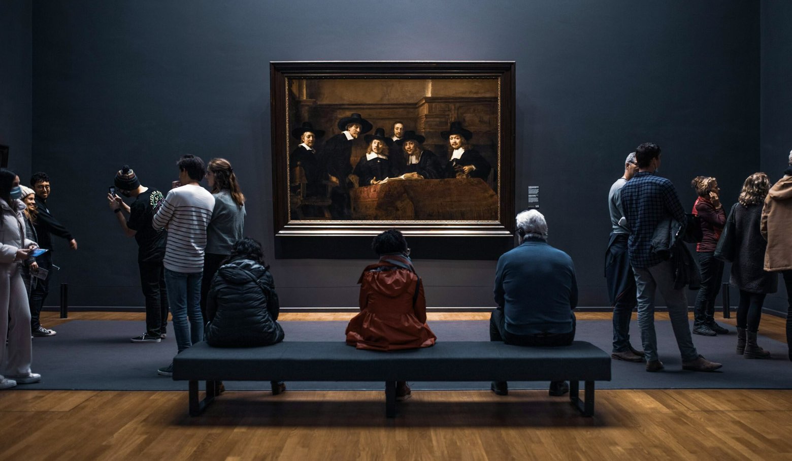 Small groups of people observing an art piece at the Dallas Museum of Art, a top spot for free things to do in Dallas with kids.