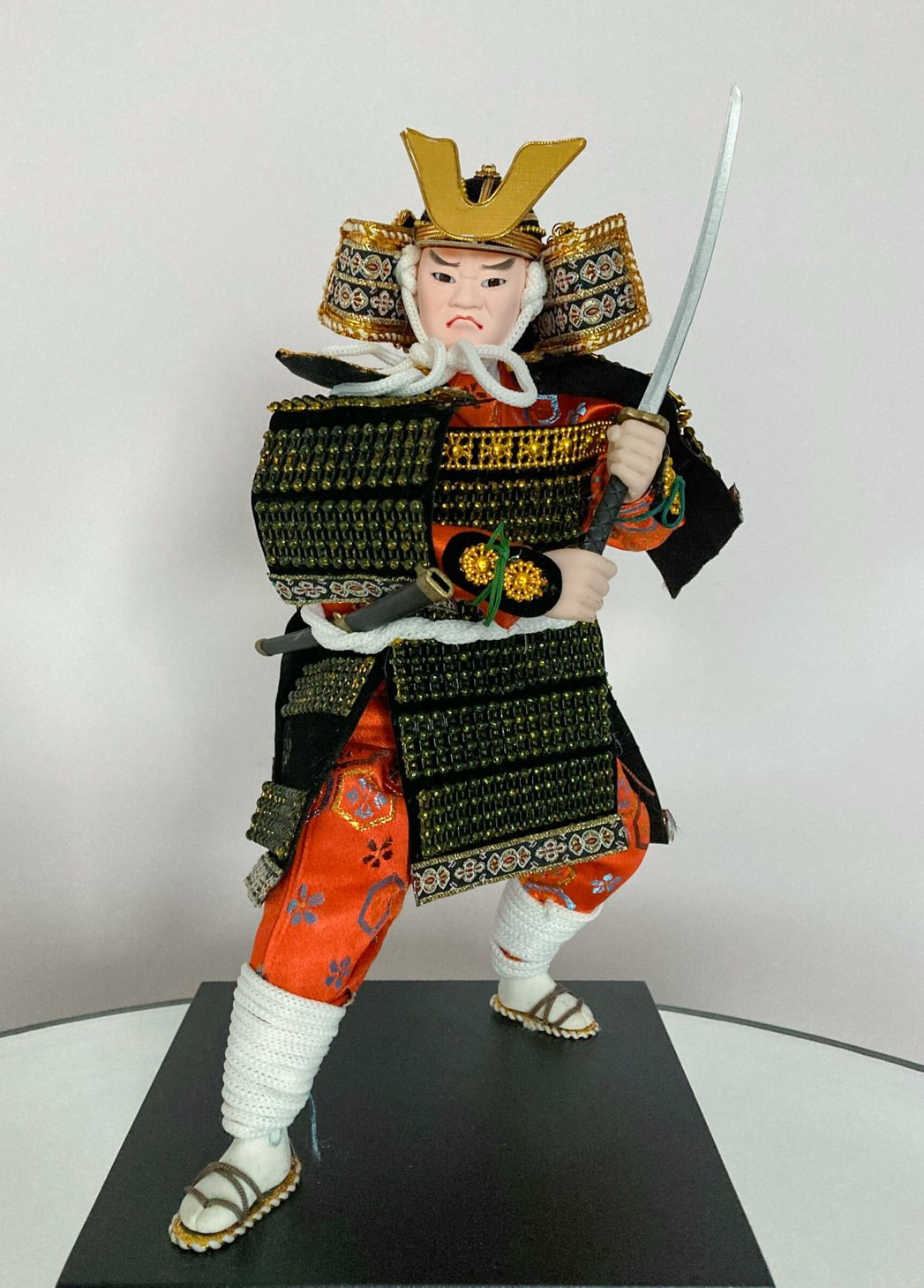 Samurai figurine dressed in traditional cloth materials at the Samurai Collection, a cultural exhibit and one of the free things to do in Dallas with kids.
