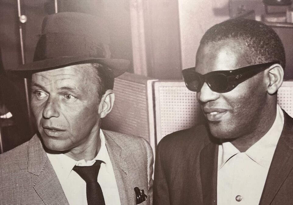 Frank Sinatra and Ray Charles displayed side by side at the African American Museum of Dallas reviews exhibit.