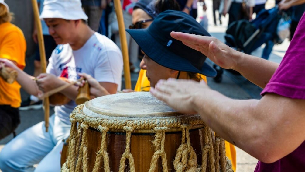 Taiko drummer and musicians perform at a Japanese Fall Festival.